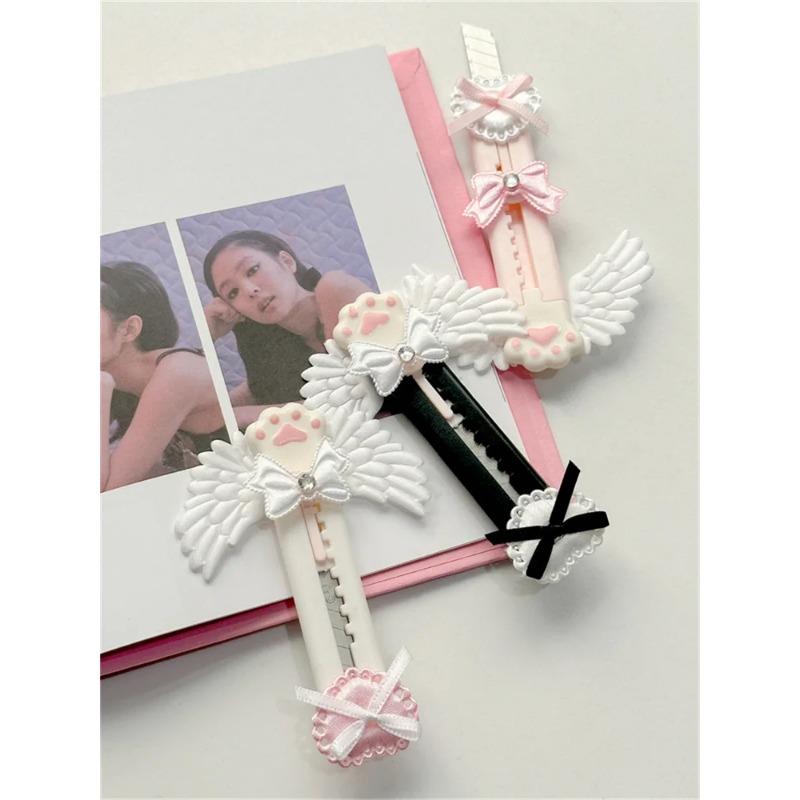 Roztomilý kočičí tlapka, univerzální nůž, krásný styl křídel s mašlí, otevírací nůž na krabice, otvírák na dopisy, obálky, poštovní nůž, školní kancelářské potřeby