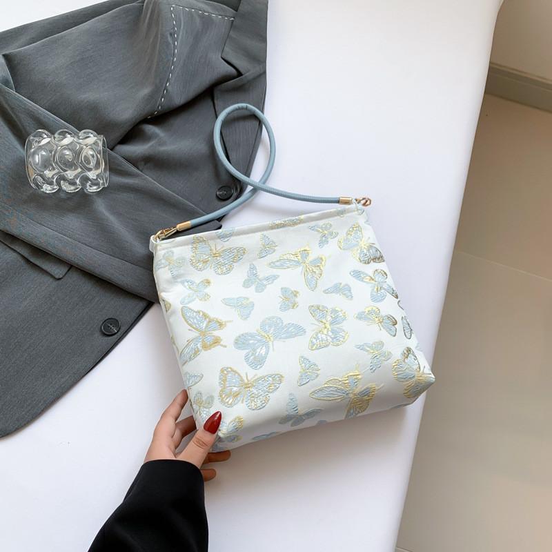 

Trendy Mid Soft Bucket Bag For Women In Cream White And Blue Perfect For Daily Use Blue