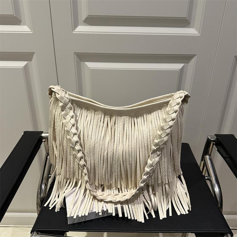 

Вместительная сумка-тоут с кисточкой, однотонная, красивая, новая, летняя, простая, повседневная, на плечо, подмышку, женская