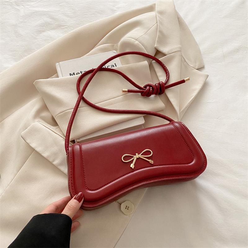 Korean version bow indentation 2025 new trendy fashion solid color design casual messenger portable small square bag women