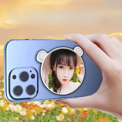 Un miroir magnétique pour autoportrait pour téléphones mobiles et un miroir de voyage haute définition au dos
