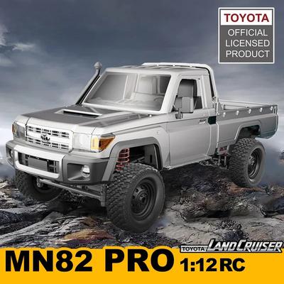 Wiederaufladbar 1:12 Vollmaß Fernbedienung Auto MN82 Verbessert Steuerbare Scheinwerfer 2,4G Allradantrieb Geländewagen Pick-up Truck Spielzeug für Kinder Geschenke