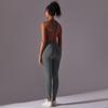 Sömlös enfärgad yogajumpsuit med öppen rygg