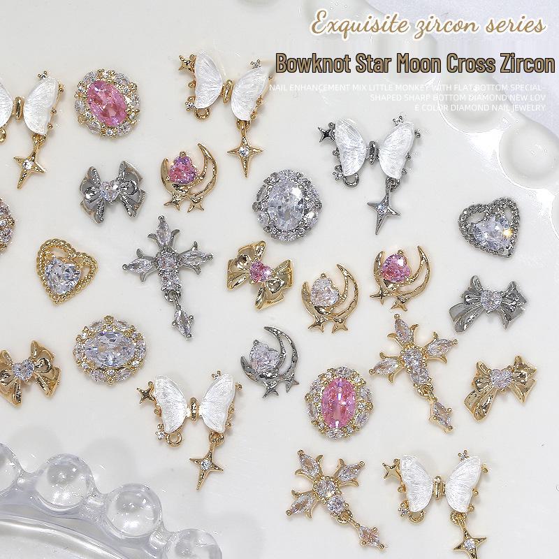 

Zircon Nail Art: Heart, Bow, Cross, Star & Moon Decorations with Sailor Moon Theme