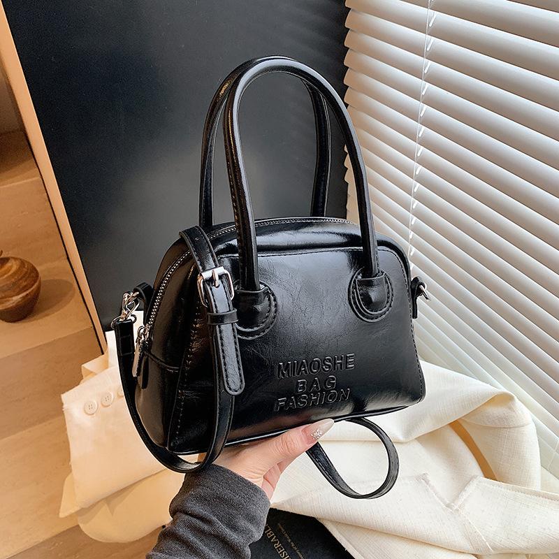 

Niche design bag women s spring and summer 2025 new fashion shoulder messenger bag women s Korean version portable bowling bag чёрный