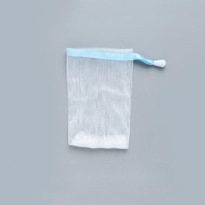

Піноутворююча сітка Невелика піноутворююча сітка Мило для рук Піноутворююча сітка Очищуючий засіб для вмивання Мило для обличчя Очищувальний засіб для миття Піноподібна сітка Сумка для мильної сітки 15*9.5cm небо синє кольору