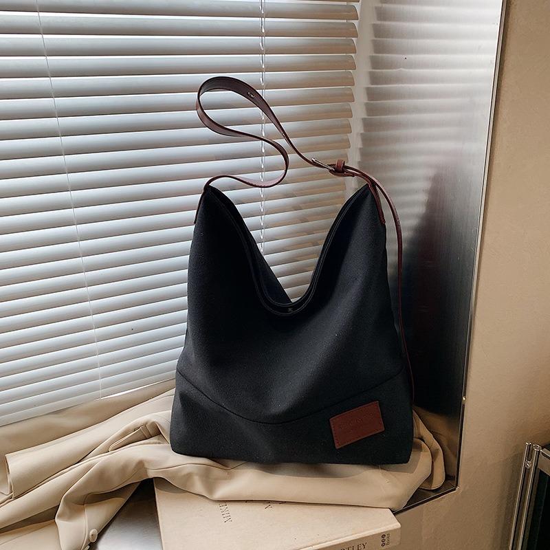Casual large-capacity canvas bag women's new spring and summer shoulder messenger bag college student tote bag