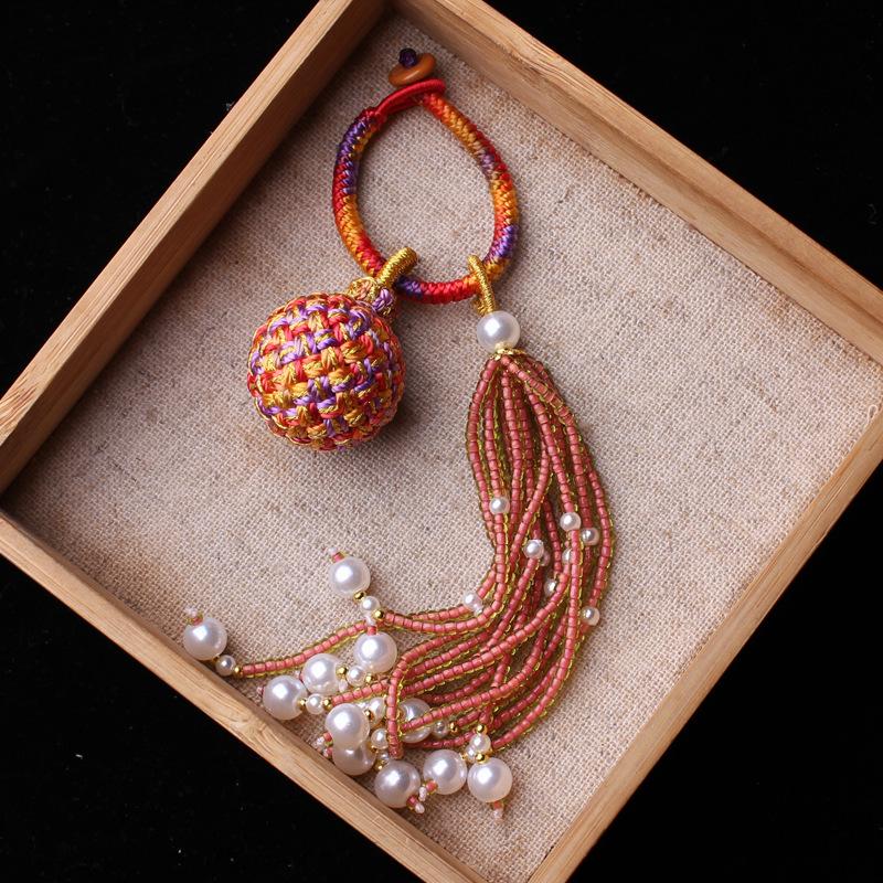 Number 16 Handmade Tassel Accessory with Ball Charm, Pearl, and Spinel Details.