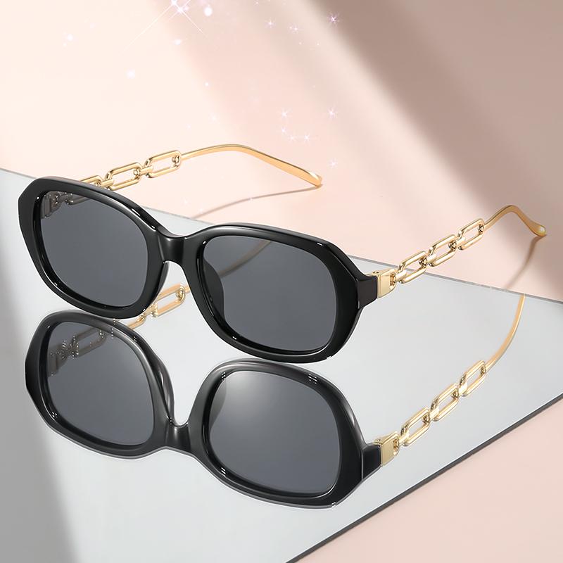 

Новые солнцезащитные очки овальной формы с дужками, соединенными металлом, — это модные и персонализированные декоративные очки чёрный