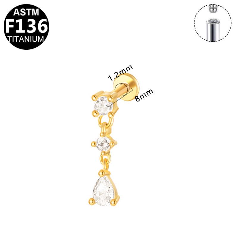 G23 Titanium Cartilage Stud with Zircon Chain and Lightning-Inlaid Titanium Lip Stud.