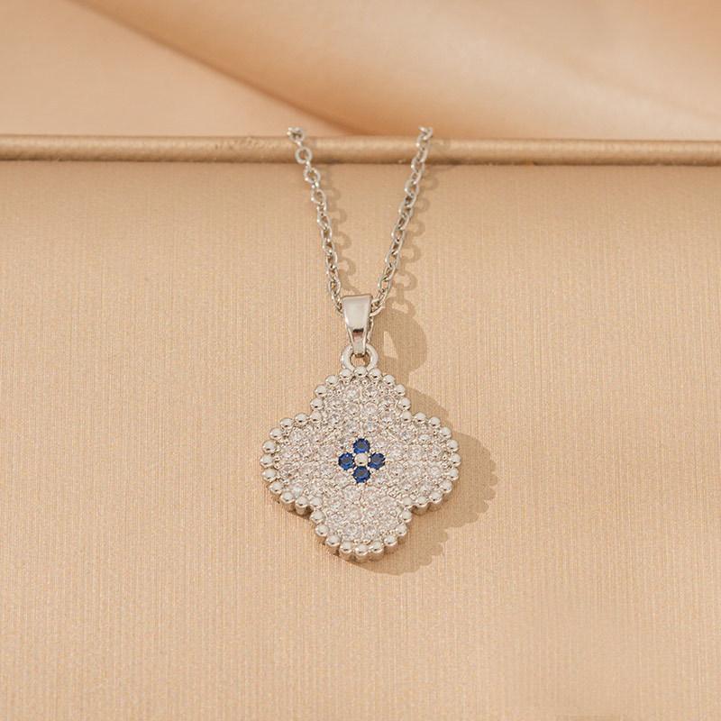 Zircon-embellished Titanium Steel Four-leaf Clover Necklace High-end Women's Earrings Pendant Ring Jewelry
