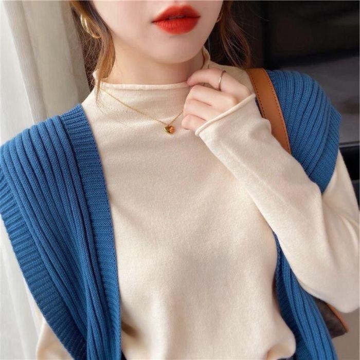 Für Schüler im Herbst und Winter kann das Tragen eines Strickpullovers als Innenschicht sie schlanker aussehen lassen.