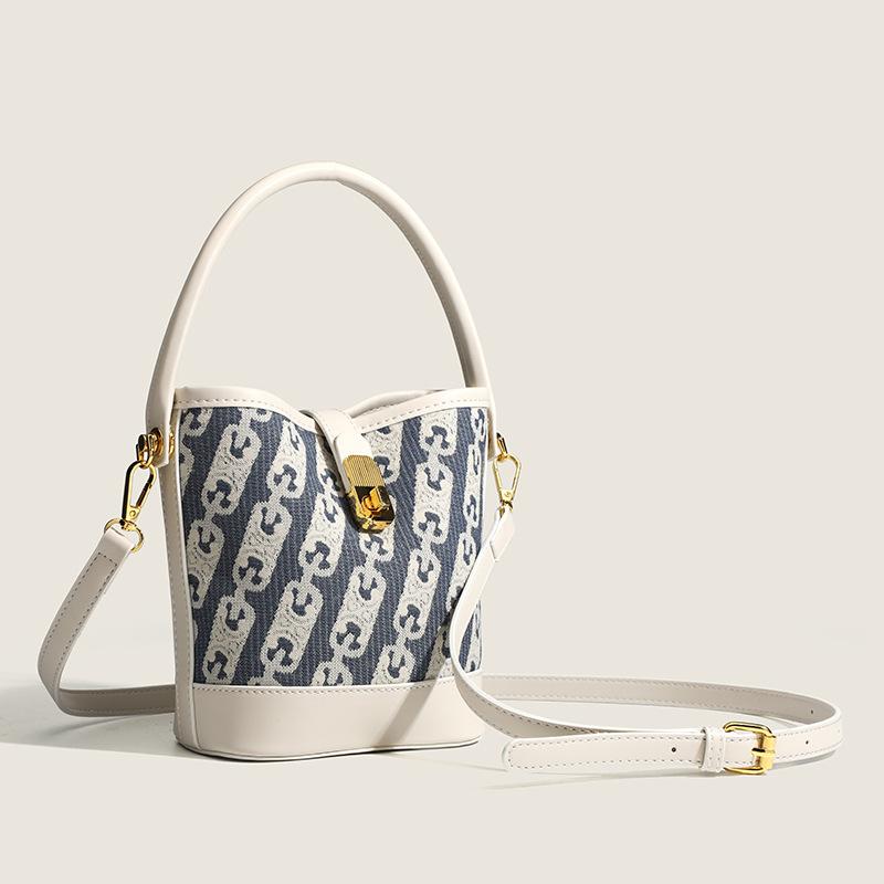 New Niche Design Simple Canvas Bucket Bag Versatile Large Capacity Commuter Portable Shoulder Messenger Bag Handbags