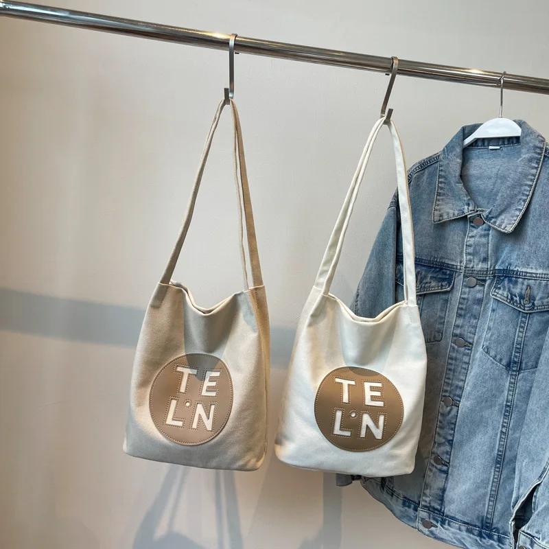 Cross-border New Letter Large-capacity Canvas Bag Women's Niche Fashion Shoulder Messenger Student Casual Tote Bag