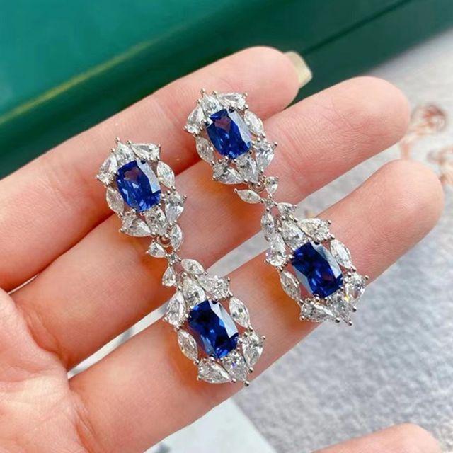 

Серьги-капли из стерлингового серебра 925 пробы 3ex овальной огранки 8 * 10 мм с необычными рубиновыми сапфирами и синтетическим муассанитом для женщин