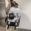 Stylish and Exquisite Contrasting Color Badge Large-capacity Backpack 24 New Primary School Junior High School Boys and Girls Schoolbag