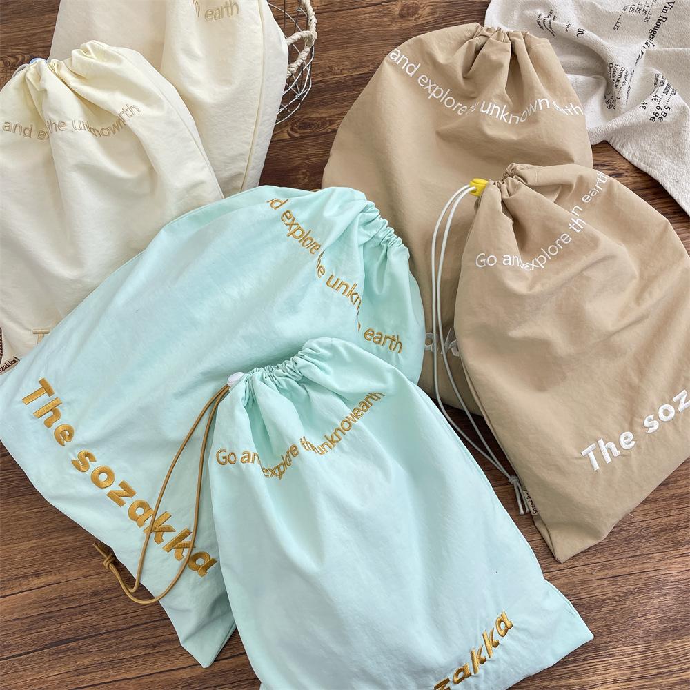 

322 Travel storage Business trip drawstring bundle finishing bag Cosmetics sub-packaging bag Sundries Underwear storage bag Small бежевий