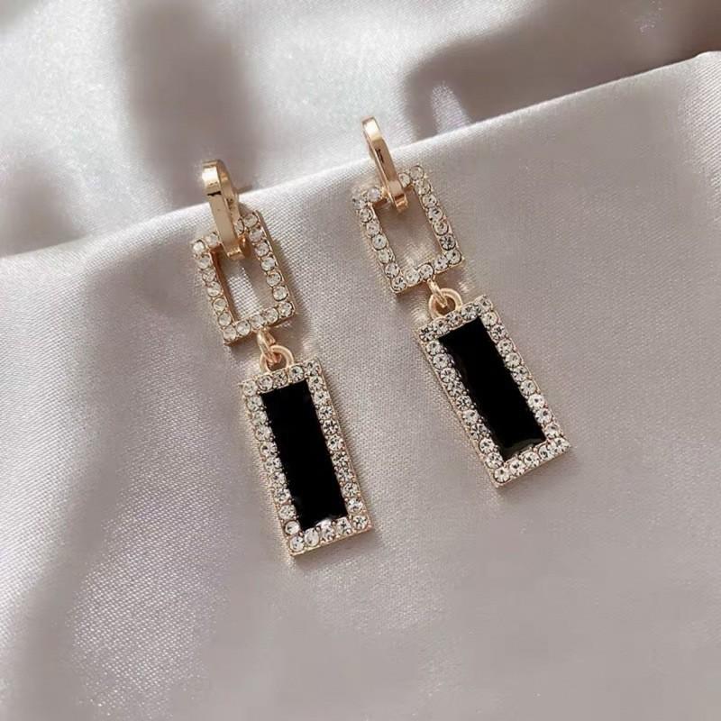 Elegant Gold-Plated Black Zircon Stud Earrings - Niche Design for a Luxurious Fashion Statement