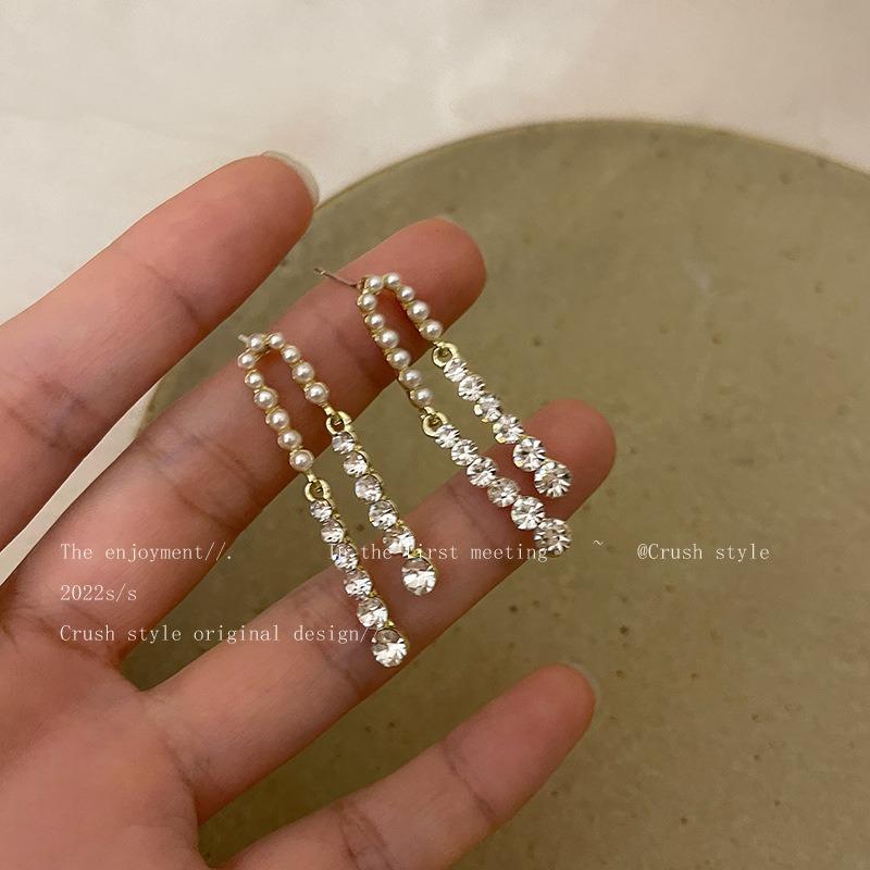 Boucles d'oreilles à longues pampilles pour femmes, style coréen Dongdaemun, design original, boucles d'oreilles polyvalentes