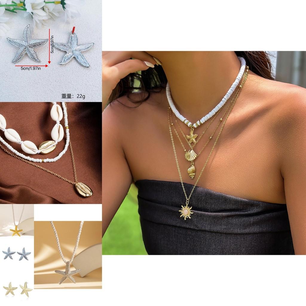 Elegante goldene Seestern-Ohrringe Stilvoller legierter Überzug Sommerschmuck für Damen