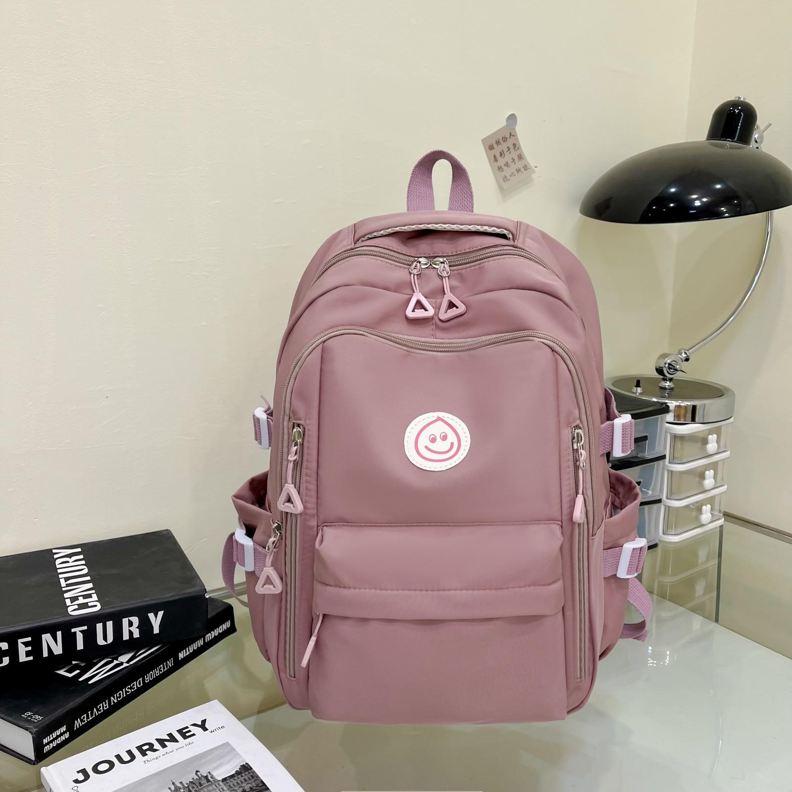 

Новий студентський рюкзак навесні та влітку 2024 р., модна дорожня сумка для відпочинку, рюкзак усміхнене обличчя рожевий