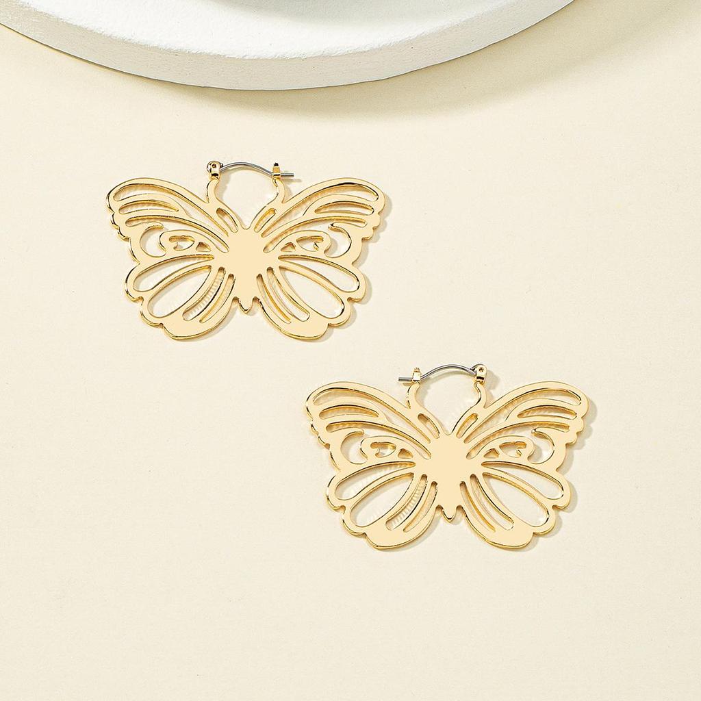 Elegant Hollow Butterfly Bowknot Earrings: High-End Metal Fashion for Women