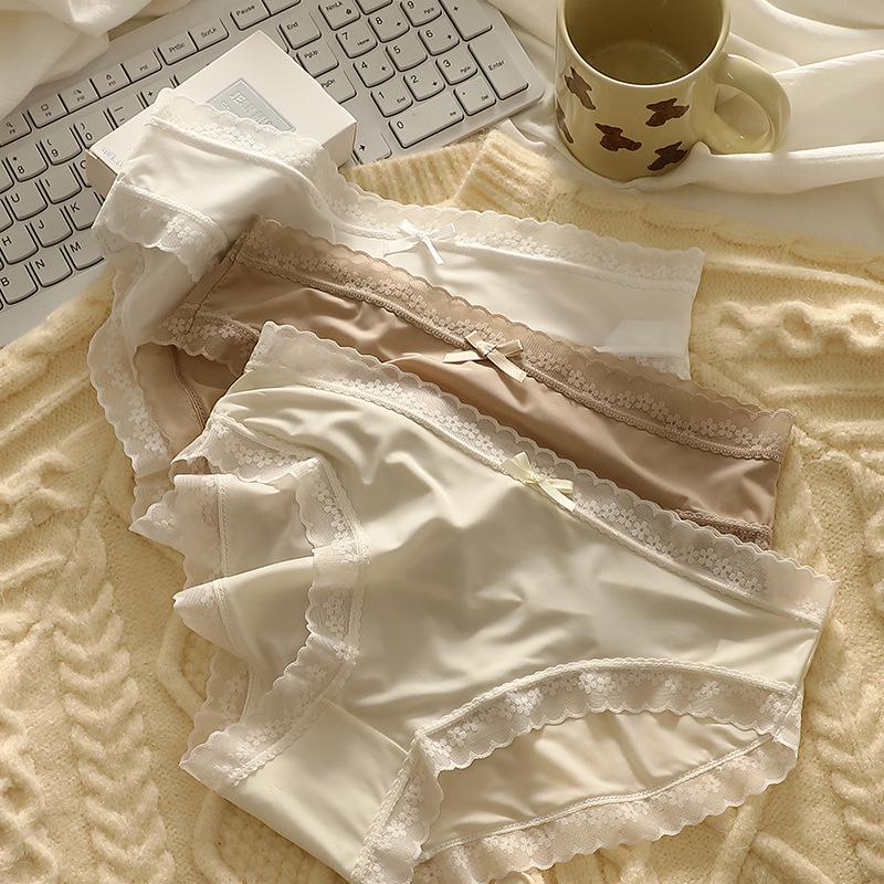 Japanska kvinnors snabbtorkande sömlösa trosor med spetskant och mellanhög midja
