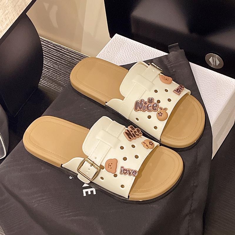 Flat-bottomed slippers women's new outer wear summer hollow soft bottom one-word drag with skirt high-end sandals