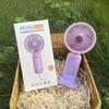 USB Rechargeable Mini Handheld Portable Fan - Compact & Minimalist Design for Summer.