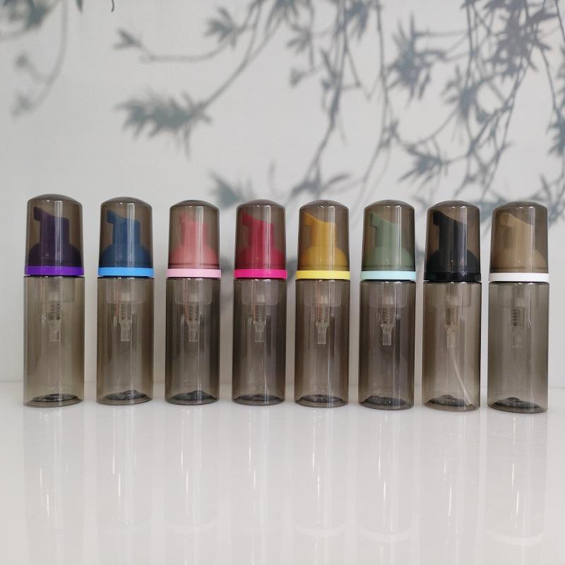 Available 60ml Transparent Black Foam Mousse Bottle for Face Wash and Travel-friendly Cosmetic Packaging.