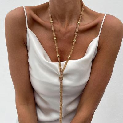 SHIXIN Elegante Knoten-Langquasten-Anhänger Halskette für Damen Sexy Goldfarbe Mehrschichtige Halskette Pulloverkette Kleid Halsschmuck