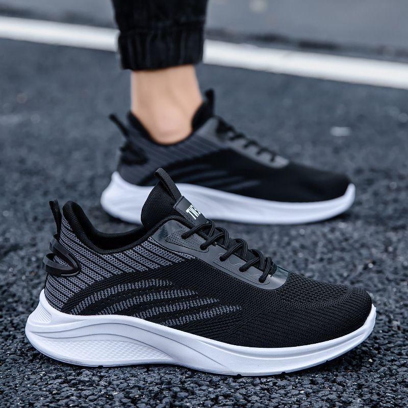 Flying woven mesh men's shoes spring and autumn sports shoes men's breathable casual shoes trendy shoes