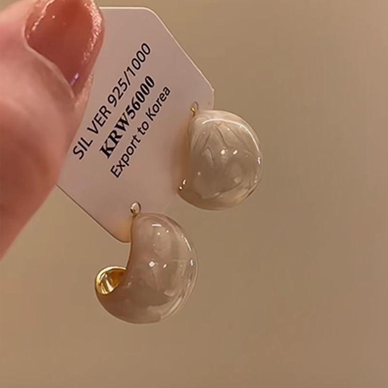 Gentle White C-shaped Bean Stud Earrings – Minimalist Geometric Design for Women.