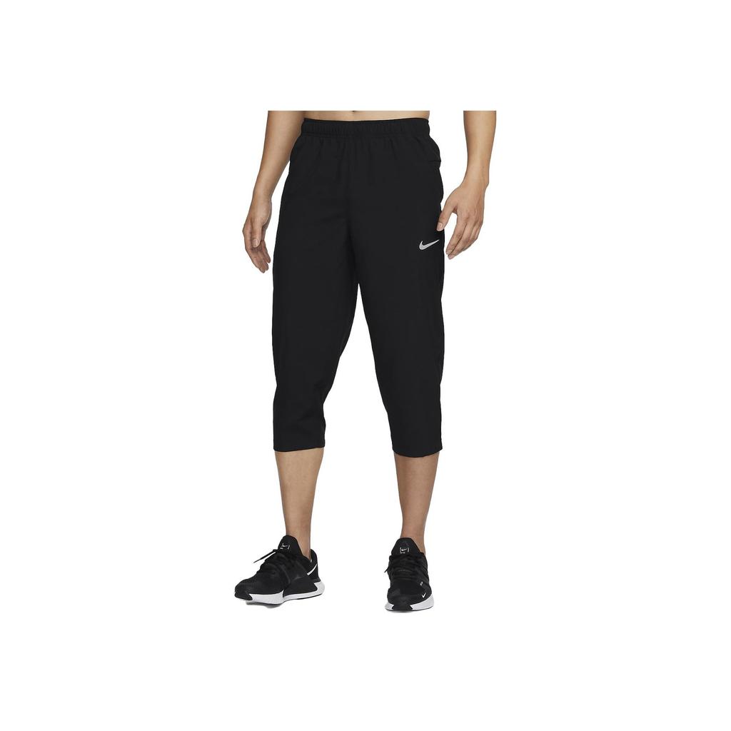 Nike Dri-FIT Pánské jednobarevné rychleschnoucí zúžené tréninkové capri kalhoty Černá FB7503-010