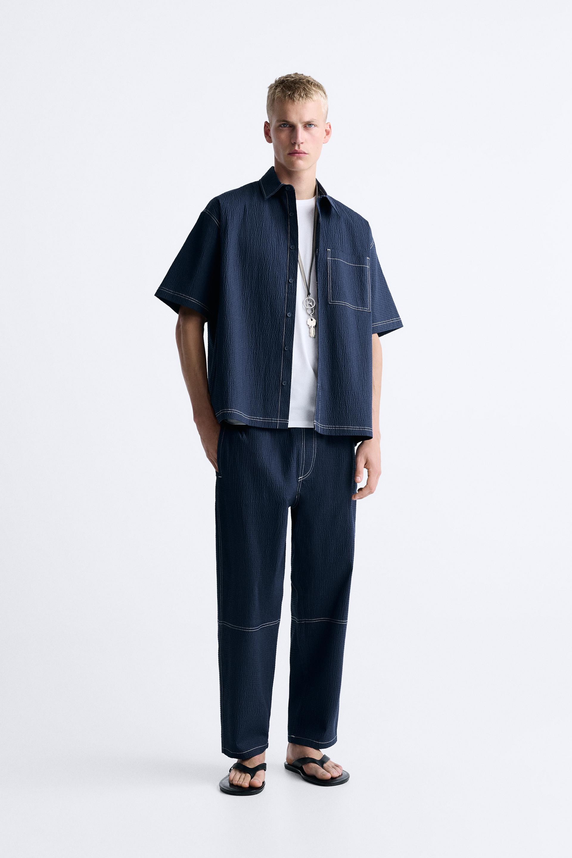 

РУБАШКА ИЗ ИЗСАКЕРА С КОНТРАСТНОЙ ОТСТРОЧКОЙ