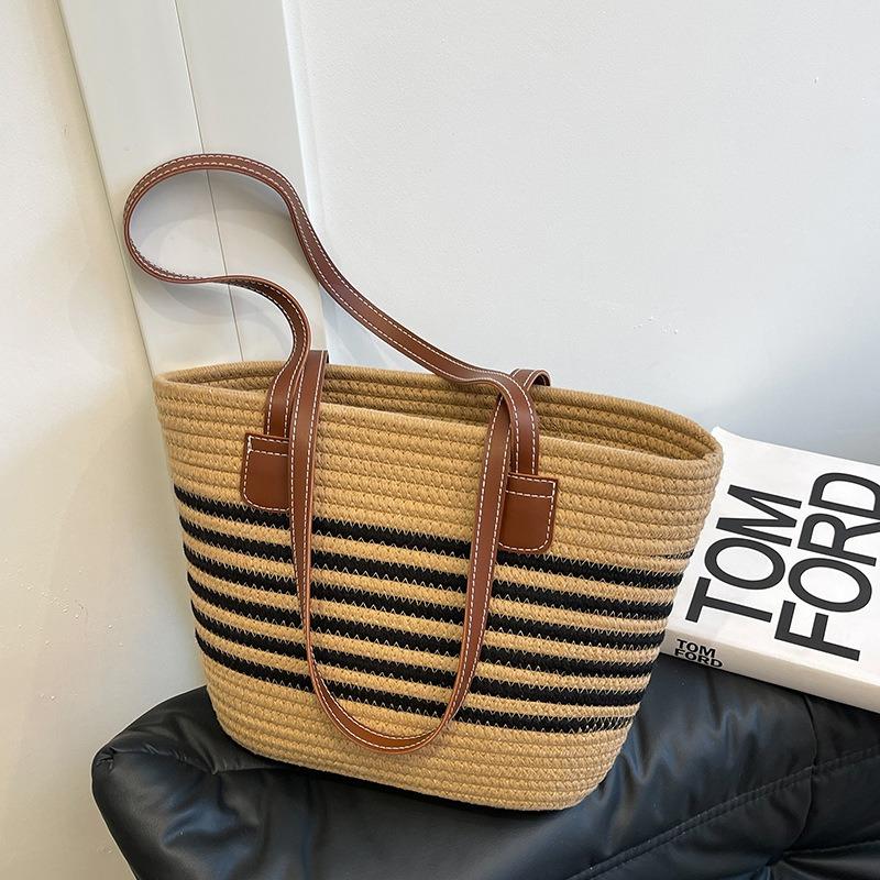 Gewebte Strohtasche Damen große Kapazität neue Sommer vielseitige Umhängetasche texturiert Pendler Strandtasche