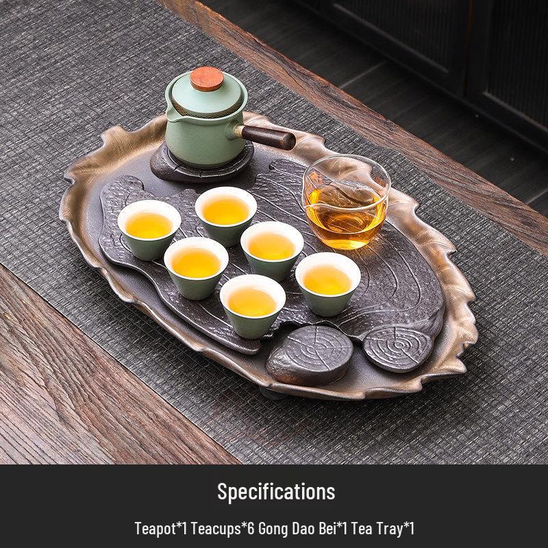 Black Pottery Tea Set with Green Handle Pot