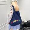 Casual canvas bag design sense niche women's bag 2025 new cartoon printed tote bag large capacity shoulder bag