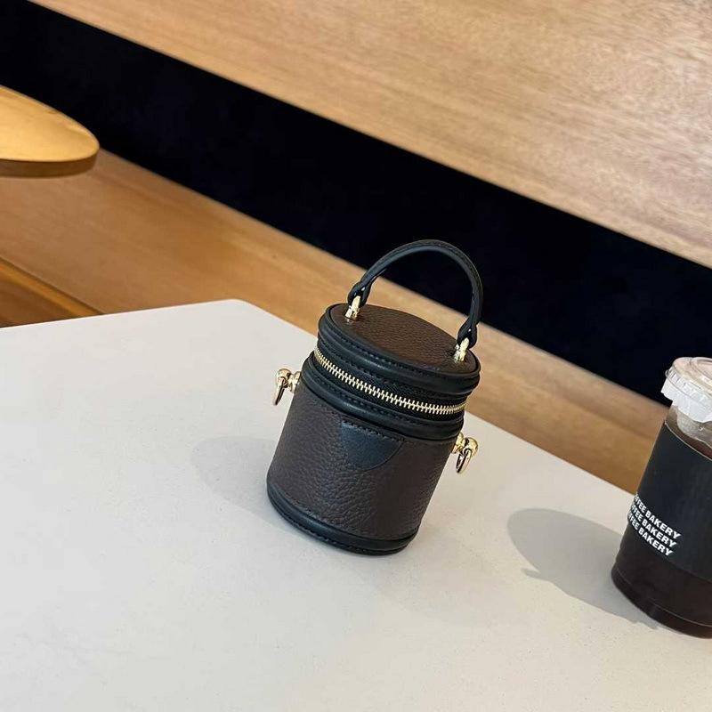 2026 new leather women's bag cylindrical vertical mini lunch box bucket bag chain earphone bag cosmetic bag cross-border batch