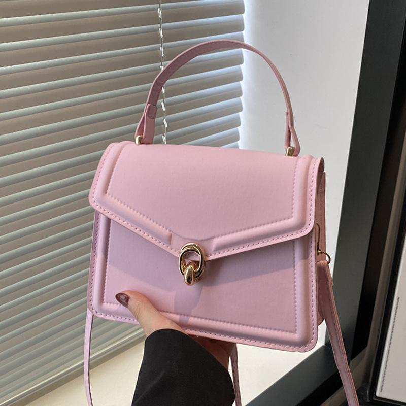 

Тенденция однотонных цветов 2025 лето новая женская повседневная модная сумка-мессенджер на плечо маленького размера с большой вместимостью и индивидуальным дизайном розовый