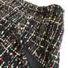 Chanel P26002V16324 Długość do kolan spódnica tweedowa z guzikiem z logo COCO czarny tweed Używana