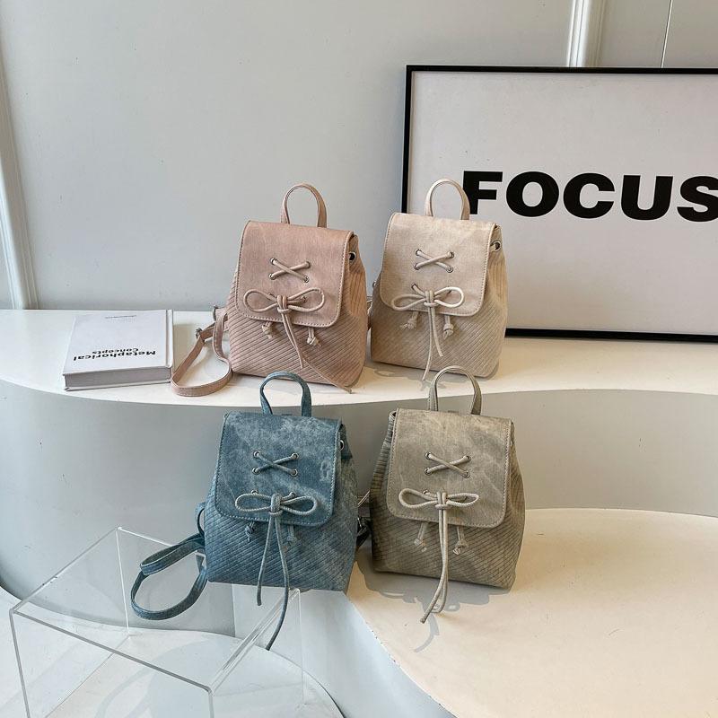 Korean version niche bow backpack bag 2025 new cute simple portable shoulder bag casual versatile schoolbag