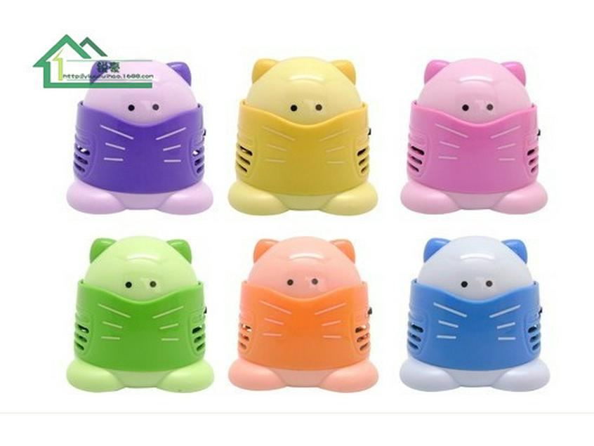 

Mini Cartoon Animal Vacuum Cleaner for Keyboard & Desktop Orange