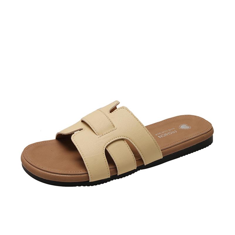 Versatile summer white outer slippers girl 2025 new niche fashion woven beach one-word drag fairy sandals