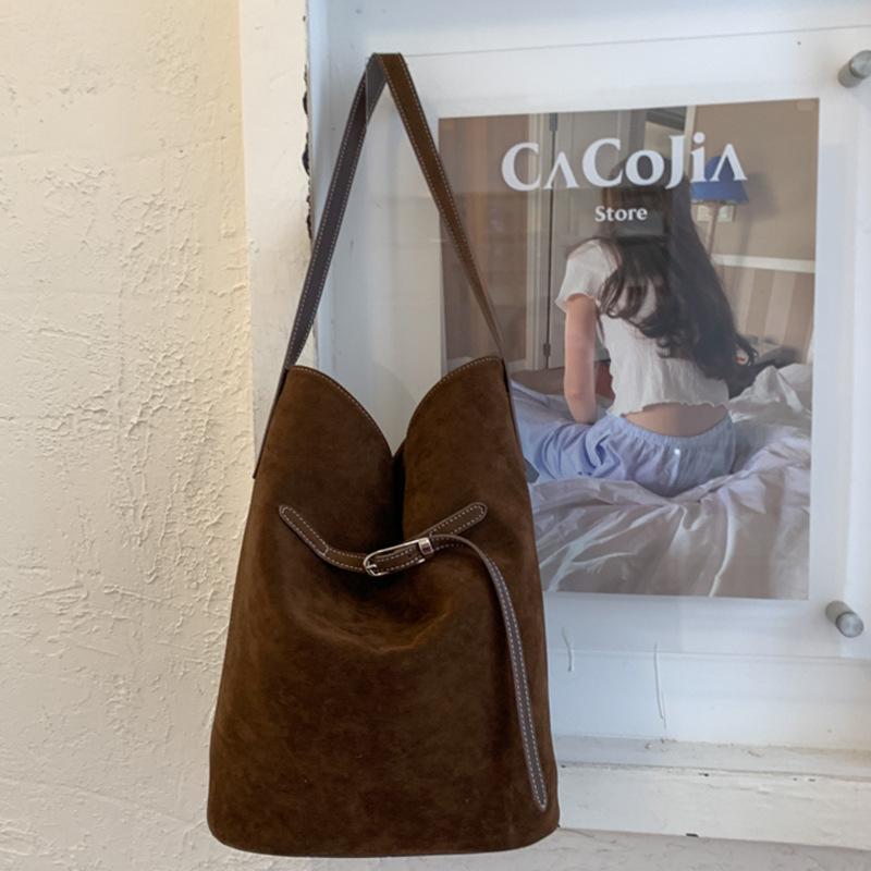 Nischen-Retro-Freizeit-Einfache Tasche Damen Herbst Neu Große Kapazität Hochwertig Modisch Tragbare Eimer-Tasche