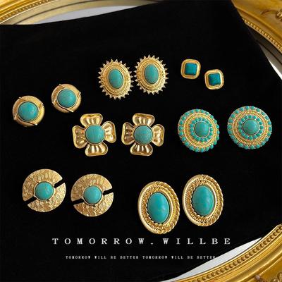 Turquoise Oorbellen uit het Midden van de Eeuw: Dames Licht Luxe Vintage Oorbellen met Zilveren Naald - High-End Modeaccessoire.