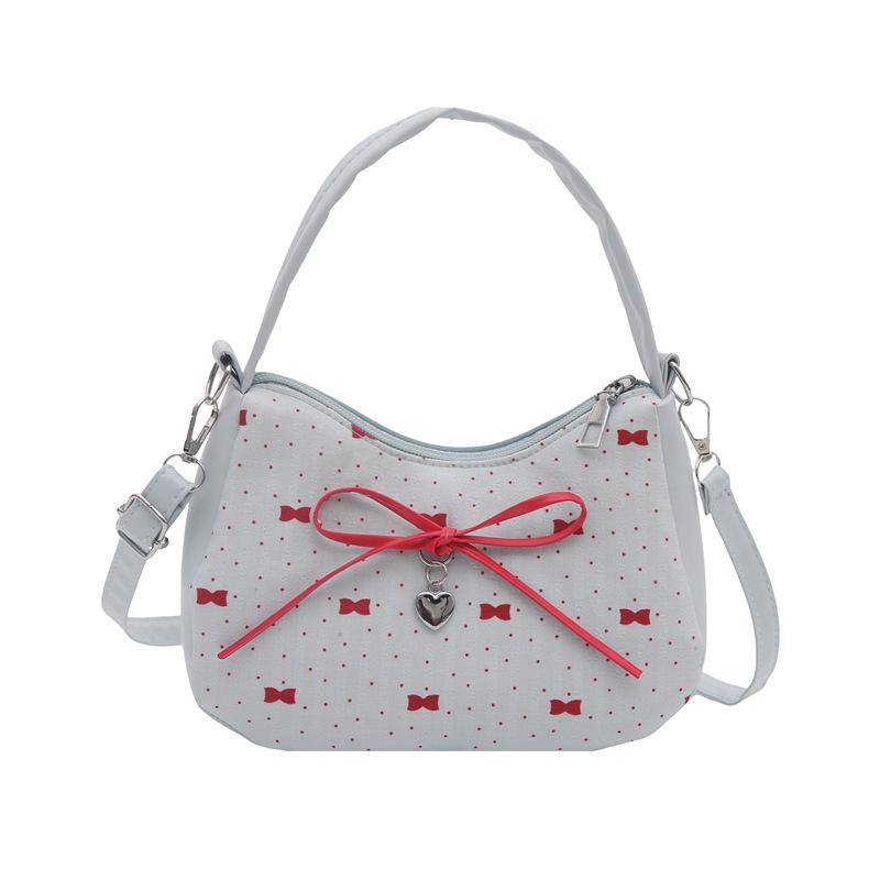 Nischen-Damentaschen mit Kontrasten, neue modische Messenger Bags mit süßer Schleife, süße und coole Babes, tragbare Halbmondtaschen.