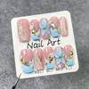 Handcrafted Press-On Nails With 3D Floral Shell Embossing Blue Pink Gradient French Tip Irregular Ombre Design Medium Length