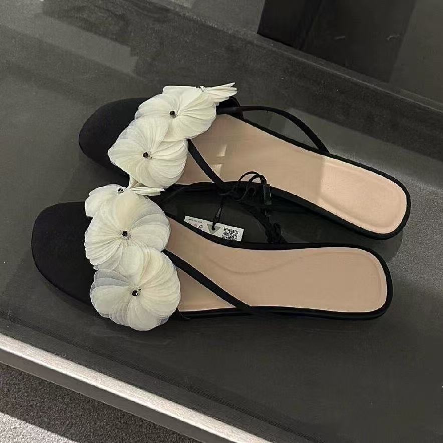 Fashion flower flat-bottomed cool slippers outside women's new vacation style empty-toed sandals