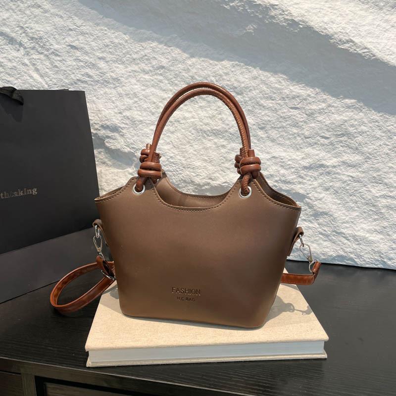 Neue Frühjahrs- und Sommermode vielseitige Pendler-Umhängetasche beliebte Textur Damentasche tragbare Bucket Bag